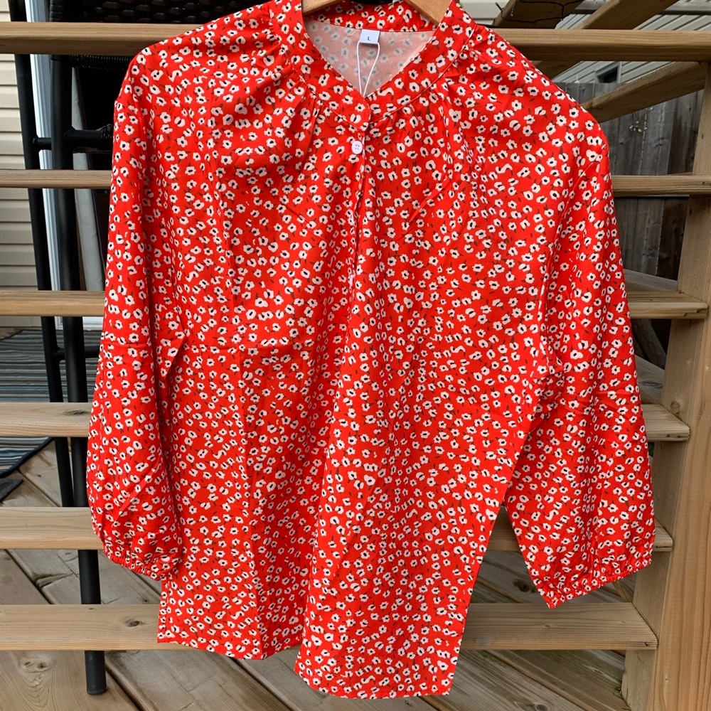 NWT Red print blouse.
